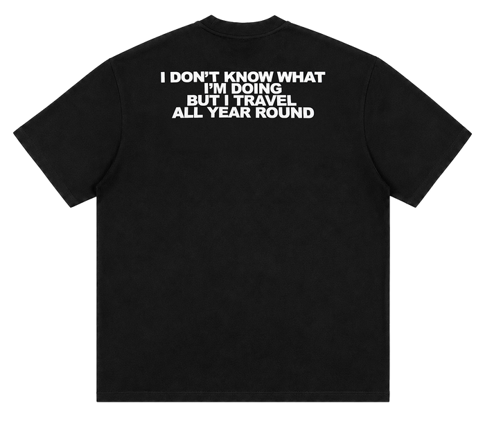I don't know what I'm doing but I travel all year round oversized t-shirt, black, back print