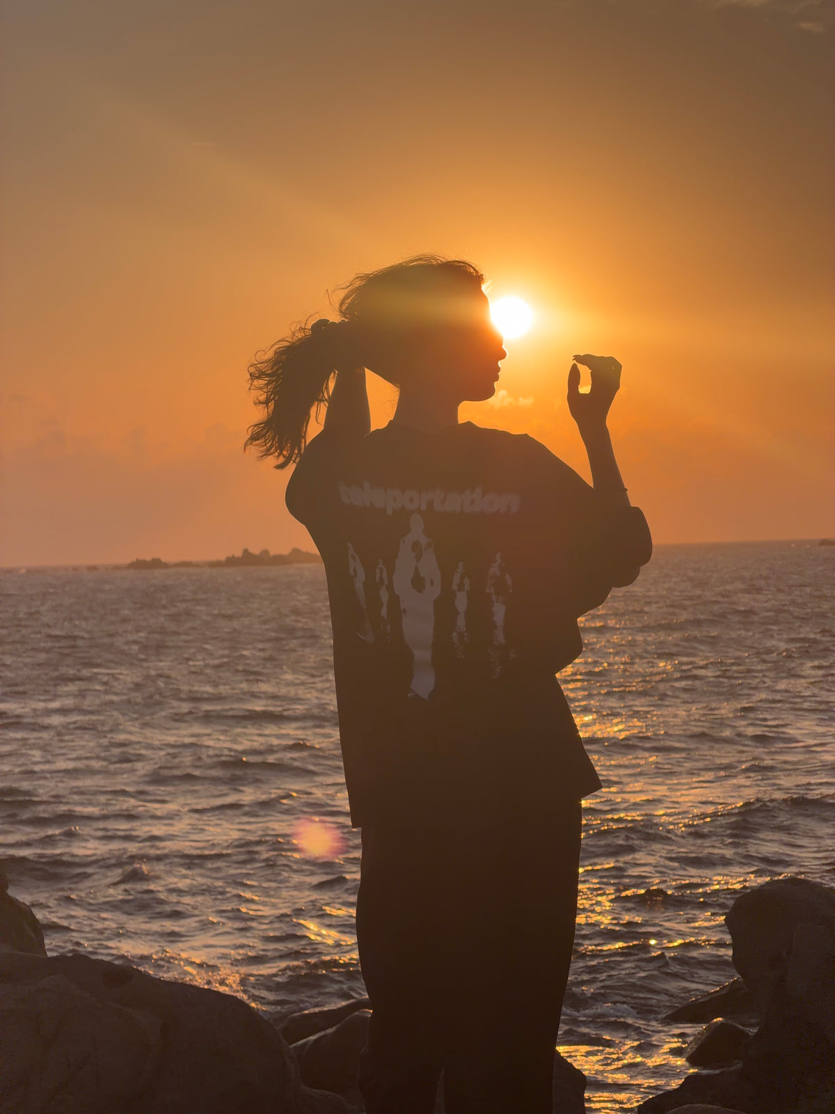 TELEPORTATION oversized t-shirt worn outdoors